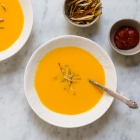 Carrot-Coconut Soup with Harissa and Crispy Leeks